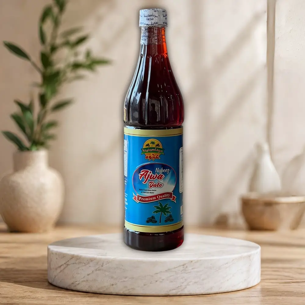 Ajwa Sharbat Nabeez Authentic Ajwa Sharbat Nabeez bottle made with premium Ajwa dates and Zamzam water, available in regular, sugar free, and brown sugar variants.