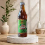800ml bottle of Ajwa Slim Zole, a natural health drink made from authentic dates and Zamzam water.